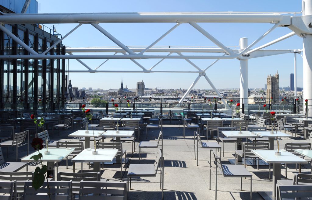 Sunny day terrasse panoramic view of Paris